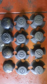 Chevrelot/opel backkie and toyota gt6 center caps. leave your whatsapp number if interested.