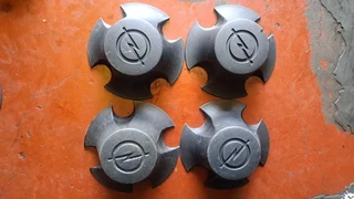 Chevrelot/opel backkie and toyota gt6 center caps. leave your whatsapp number if interested.