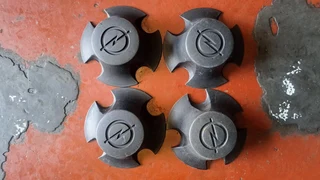 Chevrelot/opel backkie and toyota gt6 center caps. leave your whatsapp number if interested.