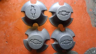 Chevrelot/opel backkie and toyota gt6 center caps. leave your whatsapp number if interested.