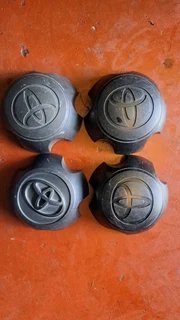 Chevrelot/opel backkie and toyota gt6 center caps. leave your whatsapp number if interested.