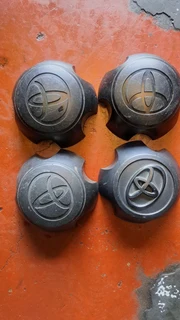 Chevrelot/opel backkie and toyota gt6 center caps. leave your whatsapp number if interested.