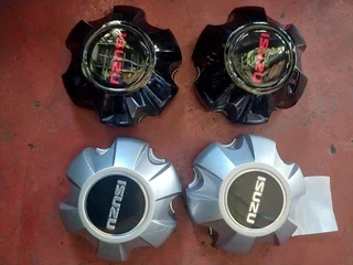 Black &amp; silver Isuzu d-max center caps available. leave your whatsapp number if interested.