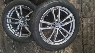 19 inche b m w mags and tires 245 50 r19, pcd 5x112. leave your whatsapp number if interested.