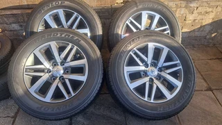 18 Inche Toyota Dakar, Gd6, Fortunerr mags & Dunlop tires. 0733076165