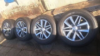Toyota Dakar, Gd6, Fortuner mags & Dunlop tires of size 265/65R18. Leave your whatsapp number: