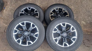 Toyota legend 50 mags with 265/65R18 continental tires, leave your whatsapp number if interested.