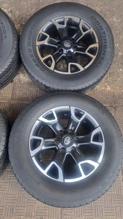 Toyota legend 50 mags with 265/65R18 continental tires, leave your whatsapp number if interested.