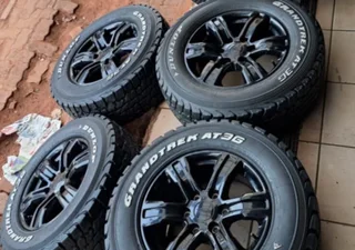 17 Inch Ford Ranger mag rims with 265/65R17 Dunlop Grandtrek tires of 92 threadleft. (Thunder, Rapto