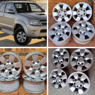15 inch Toyota Hilux OEM mag wheels 4 sale. Leave your whatsapp number if interested.