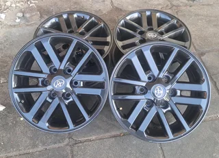 17 inch Toyota Hilux/ Fortuner black Twinspoke for sale. Leave your whatsapp number if interested