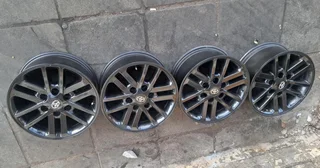 17 inch Toyota Hilux/ Fortuner black Twinspoke for sale. Leave your whatsapp number if interested