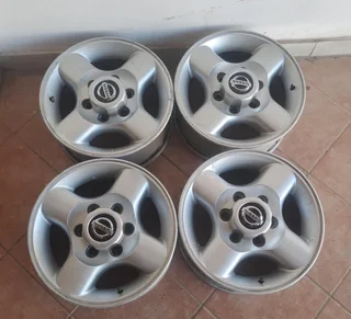 16-inch Nissan Np300 hardbody mag wheels for sale. Leave your whatsapp number if interested