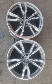 ✅22 inch BMW X5 mag rims, one back and one front. Leave your whatsapp number if interested.