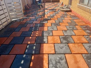 Artificial grass and paving installation