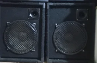 Dixon Amp and 2 disco 12 inch speakers