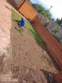 Fit and supply kikuyu grass with top soil