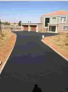 Tar surfacing road markings slurry seal