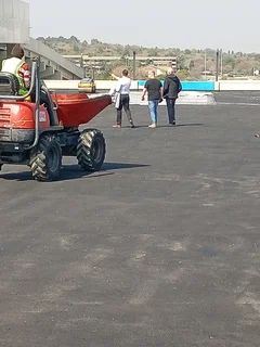 Tar surfacing road markings slurry seal