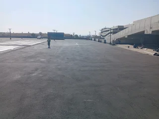 Tar surfacing road markings slurry seal brick paving