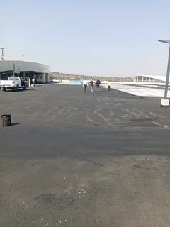 Asphalt tar surfacing road markings slurry seal brick paving