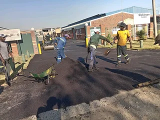 Asphalt tar surfacing road markings slurry seal brick paving