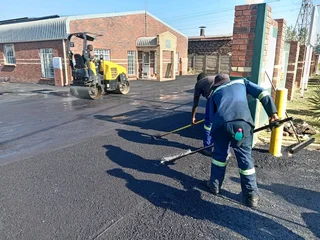 Asphalt tar surfacing road markings slurry seal brick paving