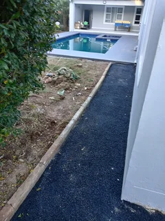 Asphalt tar surfacing road markings slurry seal brick paving