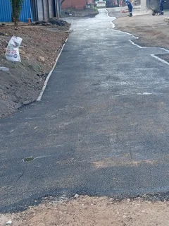 Asphalt tar surfacing road markings slurry seal brick paving