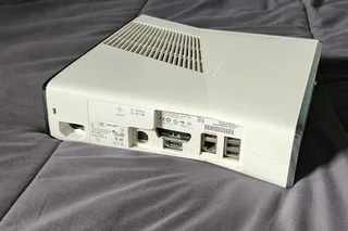 Xbox 360,2 controllers with one charger, and 16 games