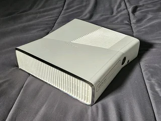 Xbox 360,2 controllers with one charger, and 16 games