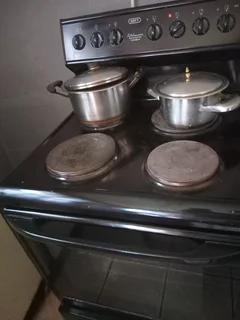 DEFY KITCHENAIRE ,MULTIFUNCTION THERMOFAN ,STOVE in fair condition 3 of 4 plates work
