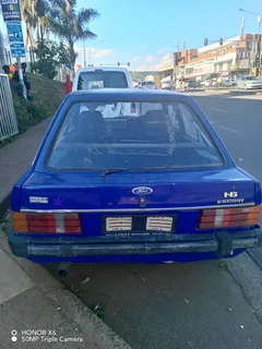 Ford Escort running car with license