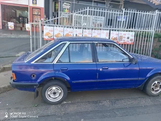 Ford Escort running car with license