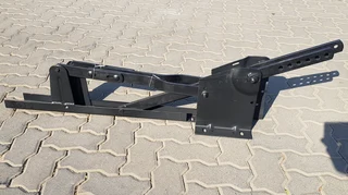 Tip-up garage door hinges