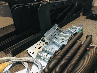Torsion Springs, Tension Springs, Hinges and Garage door cables