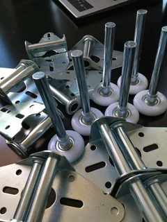 Silver steel hinges and sectional wheels