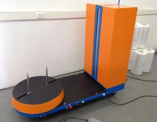 Luggage wrap machines