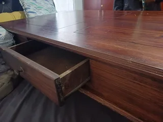 Antique table with draws can be used as a TV stand