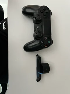PS4 with games and adaptive trigger
