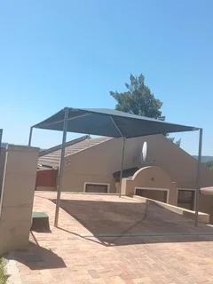 We do SHADEPORTS and CARPORTS STRUCTURES Call or WhatsApp 069 912 9265