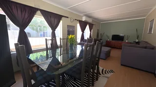 Immaculate 3 bedroom, two bathroom house with a bachelors flat.