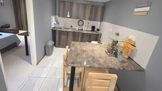 Immaculate 3 bedroom, two bathroom house with a bachelors flat.