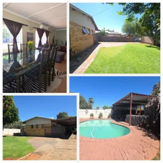 Immaculate 3 bedroom, two bathroom house with a bachelors flat.