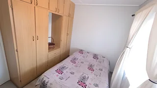 Immaculate 3 bedroom, two bathroom house with a bachelors flat.