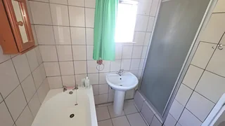 Immaculate 3 bedroom, two bathroom house with a bachelors flat.