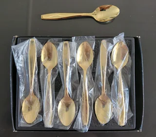 23 Karat Gold plated teaspoons x 7.  R 2000 Neg.