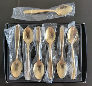 23 Karat Gold plated teaspoons x 7.  R 2000 Neg.