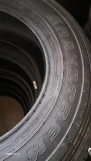 4x 265/65/17 DUNLOP GRAND TRACK AT 25