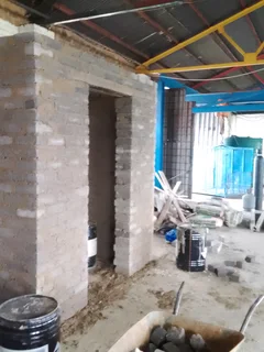 Brick laying and plaster